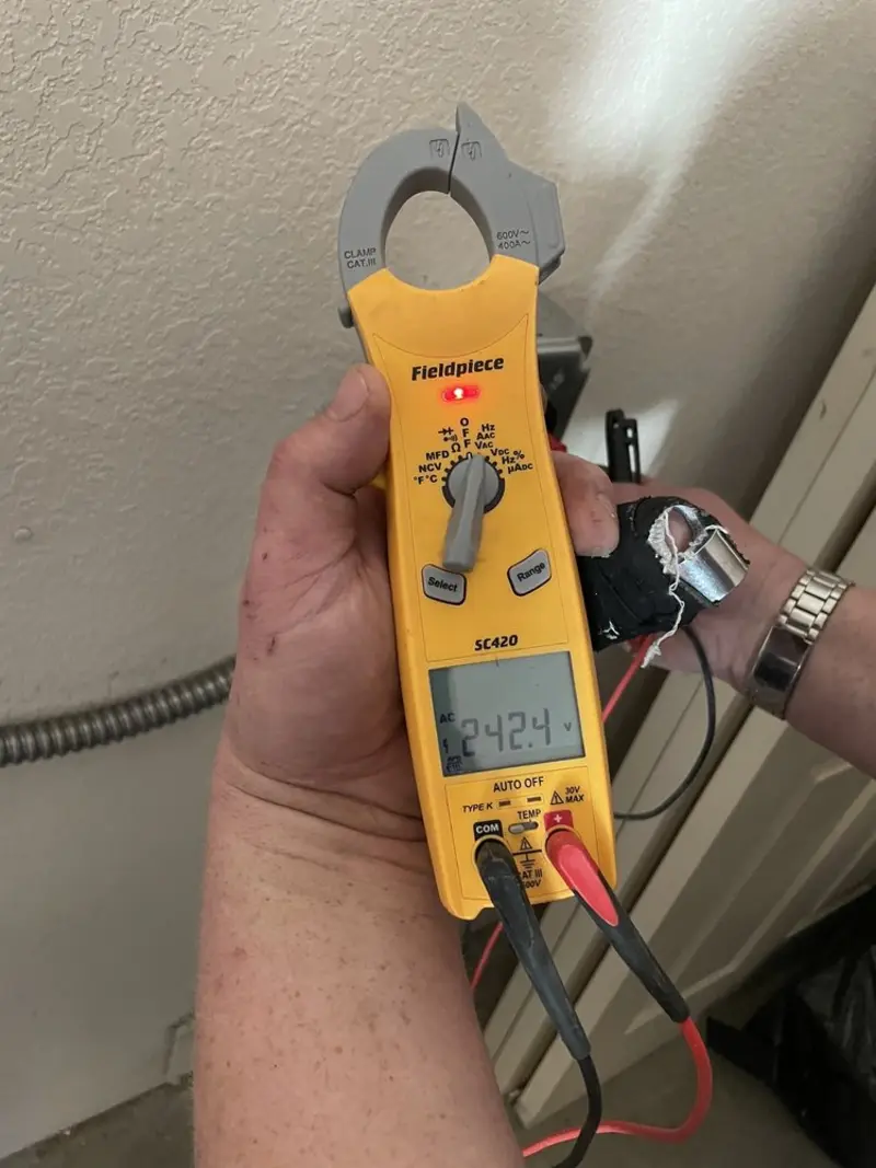Voltage testing with clamp meter during Generator Installation in Boonsboro